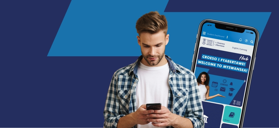 Smiling students looking at a mobile phone