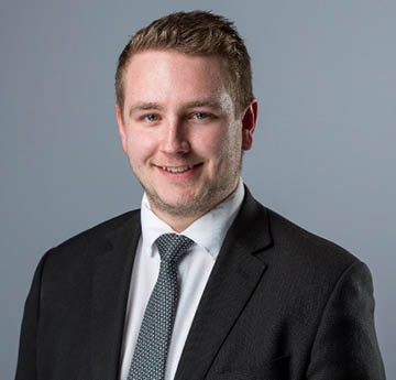 Professional headshot of George, a student who successfully got a job following accessing careers support 