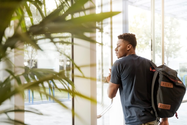 Student leaving a building
