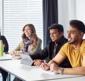 Students gathered at a table