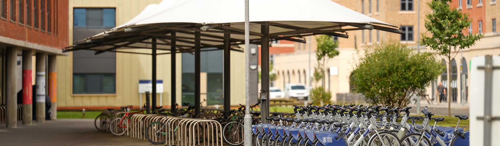 Secure bike parking outside School of Management Building on Bay Campus