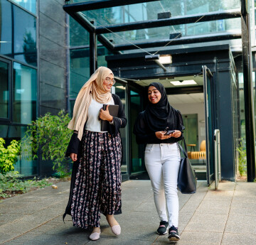 Students talking outside the Digital Technium Building