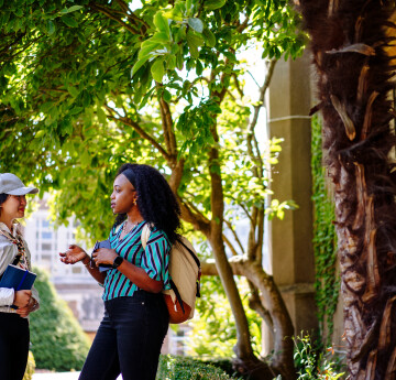 Students talking by trees on Singleton Campus